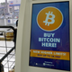 A bitcoin ATM reading Buy bitcoin here, New Higher Limits, buy up to $8,500!